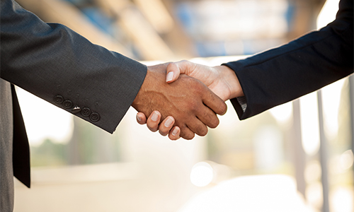 A handshake representing the collaboration required to achieve APWA's public policy priorities